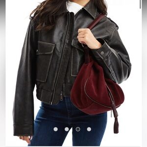 ASOS design premium suede tassel bucket shoulder bag in burgundy